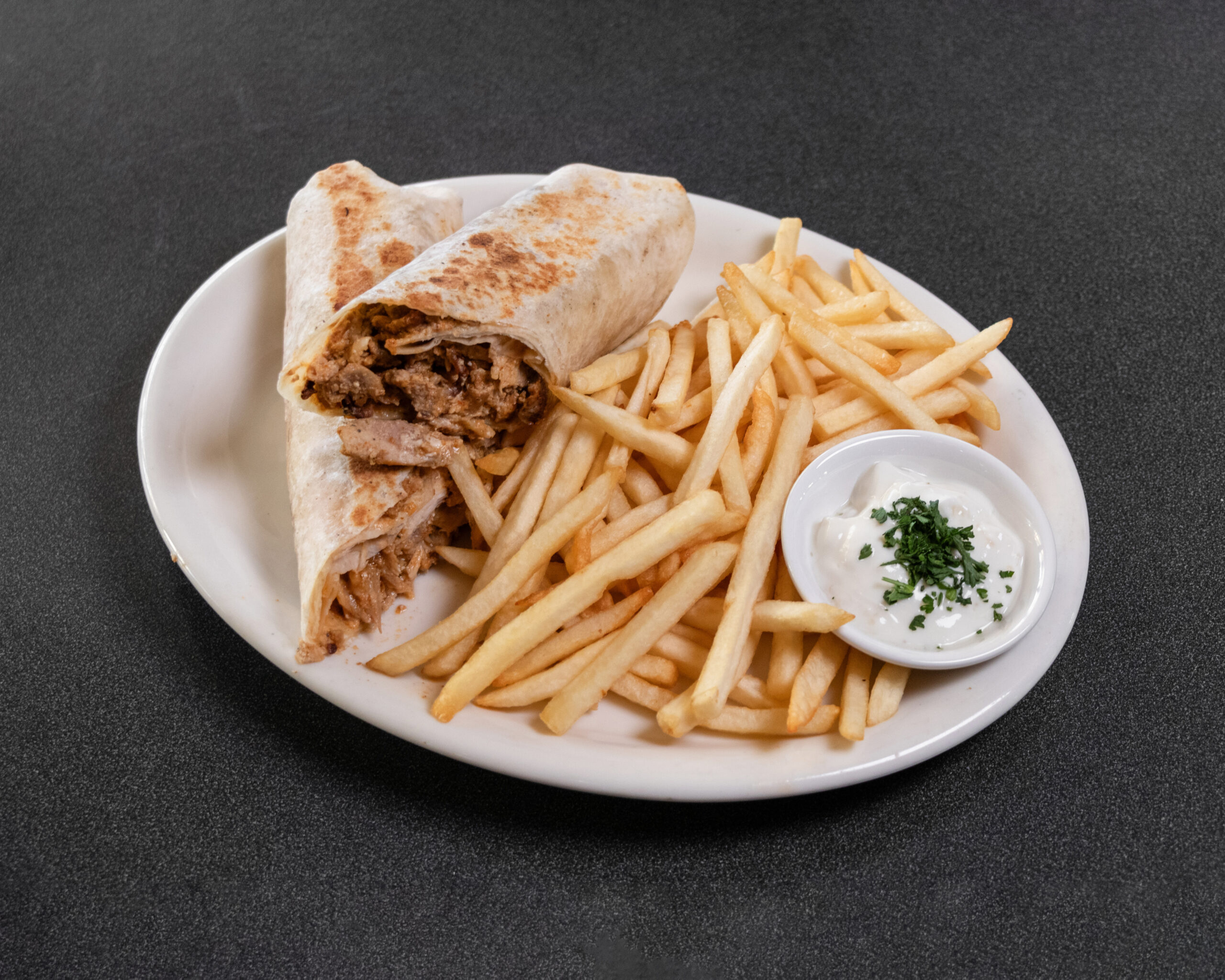 Mediterranean beef koobideh wrap with grilled beef kabob and fresh vegetables at Jasmine Grill & Cafe