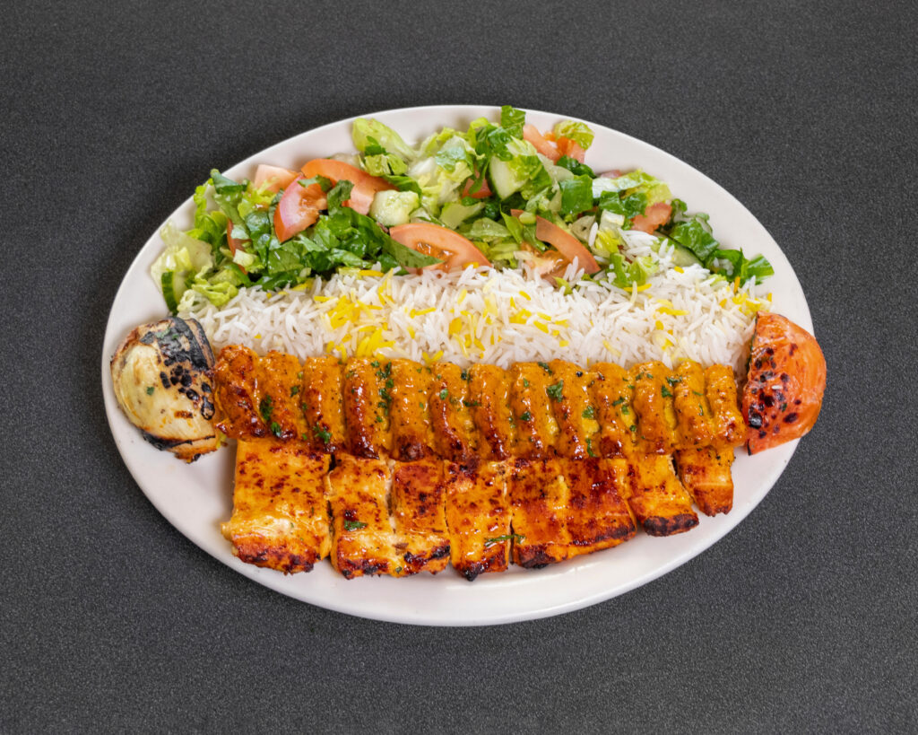 Mediterranean chicken barg kabob with hummus, basmati rice and salad at Jasmine Grill & Cafe