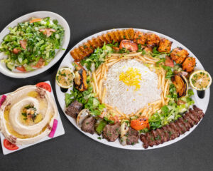 Mediterranean family combo kabob platter with beef, chicken, koobideh and basmati rice at Jasmine Grill & Cafe