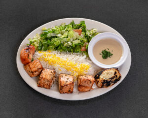 Mediterranean grilled salmon plate with saffron basmati rice and fresh salad at Jasmine Grill & Cafe