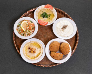 Mediterranean large kabob platter with assorted appetizers, hummus and falafel at Jasmine Grill & Cafe